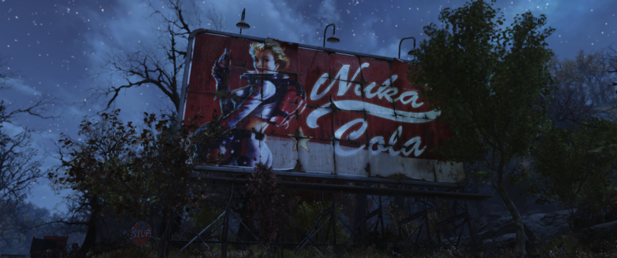 A battered Nuka Cola sign