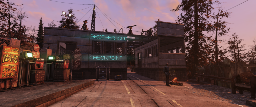 A player CAMP from Fallout 76 designed to look like a Brotherhood of Steel checkpoint.